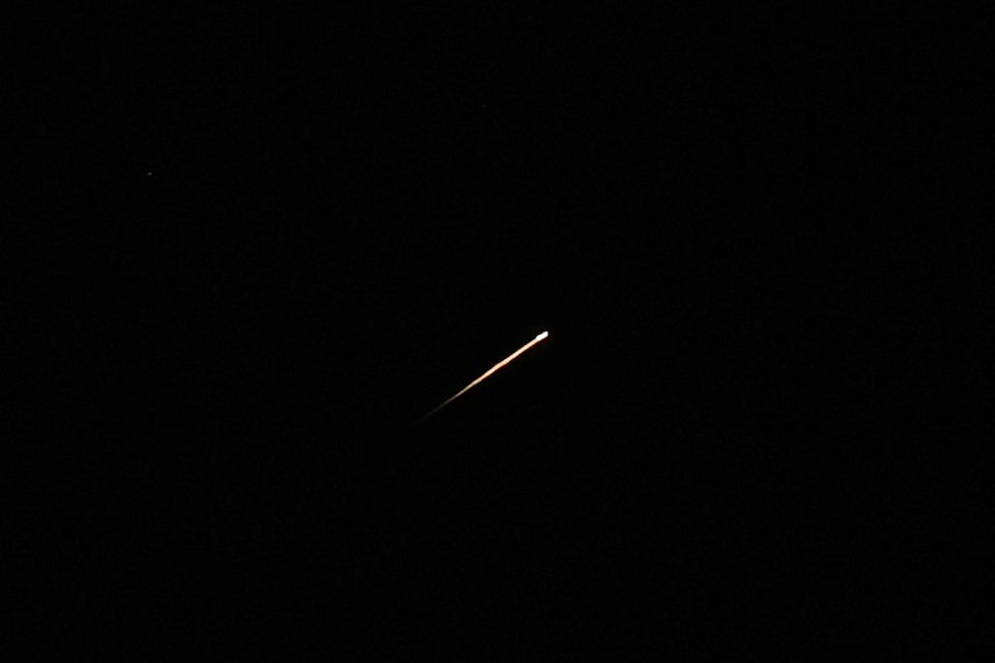 A streak of light illuminates the sky during a missile attack from Iran towards Israel, as seen from Jerusalem, on June 7, 2026 — Reuters photo