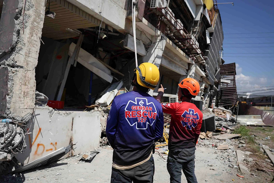 Rescuers inspect a damaged building following an earhtquake in General Santos, Philippines on Tuesday, June 9, 2026 — AP photo