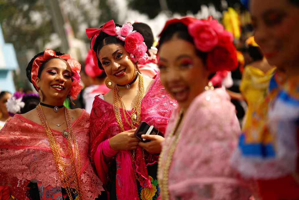 FIFA World Cup 2026 - Group A - Mexico v South Africa - Estadio Azteca, Mexico City, Mexico - June 11, 2026 Mexico fans wear traditional clothing outside the stadium before the match REUTERS/Hannah Mckay