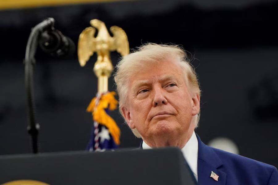 U.S. President Donald Trump looks on as he stands in front of the VC-25B aircraft gifted by Qatar that will be used as Air Force One, at Joint Base Andrews, Maryland, U.S., June 19, 2026.