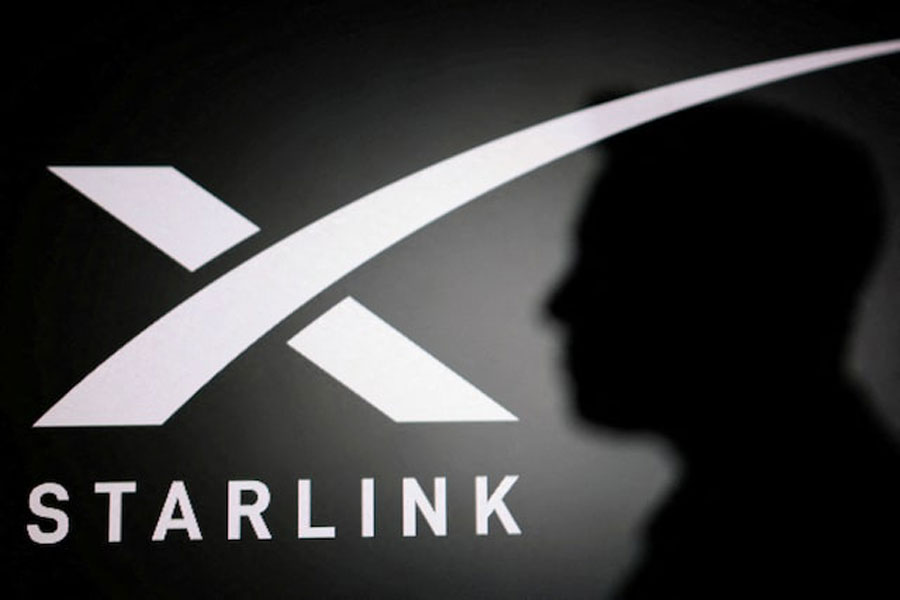 The silhouette of Elon Musk and Starlink logo are seen in this illustration taken June 11, 2026.