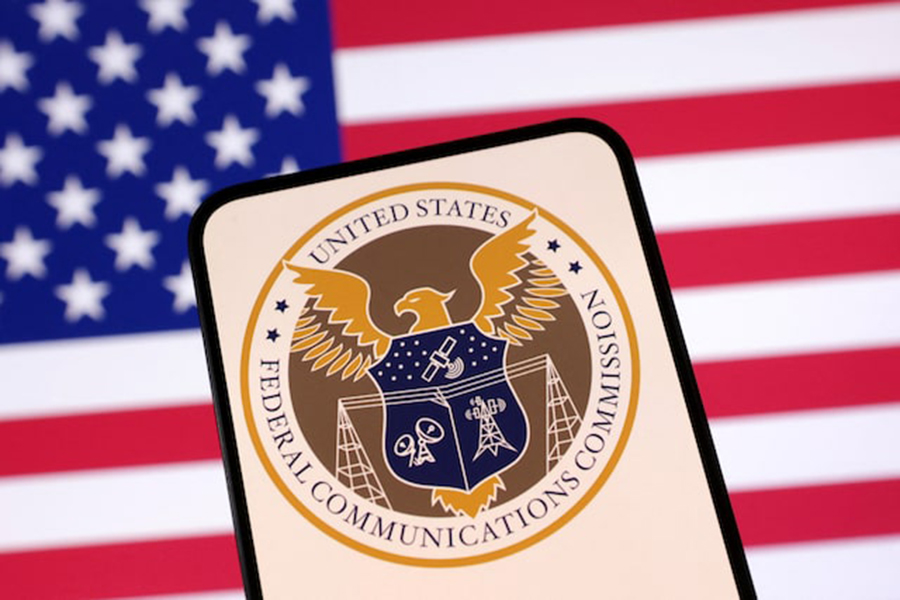 United States Federal Communications Commission logo and US flag are seen in this illustration taken on April 23, 2025. — Reuters/File
