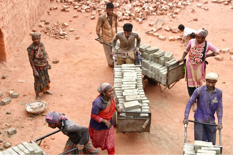 People work at a brickfield in Savar on the outskirts of Dhaka, Bangladesh, March 7, 2020. An inclusive economy requires policies that actively support labour-intensive sectors —Xinhua Photo
