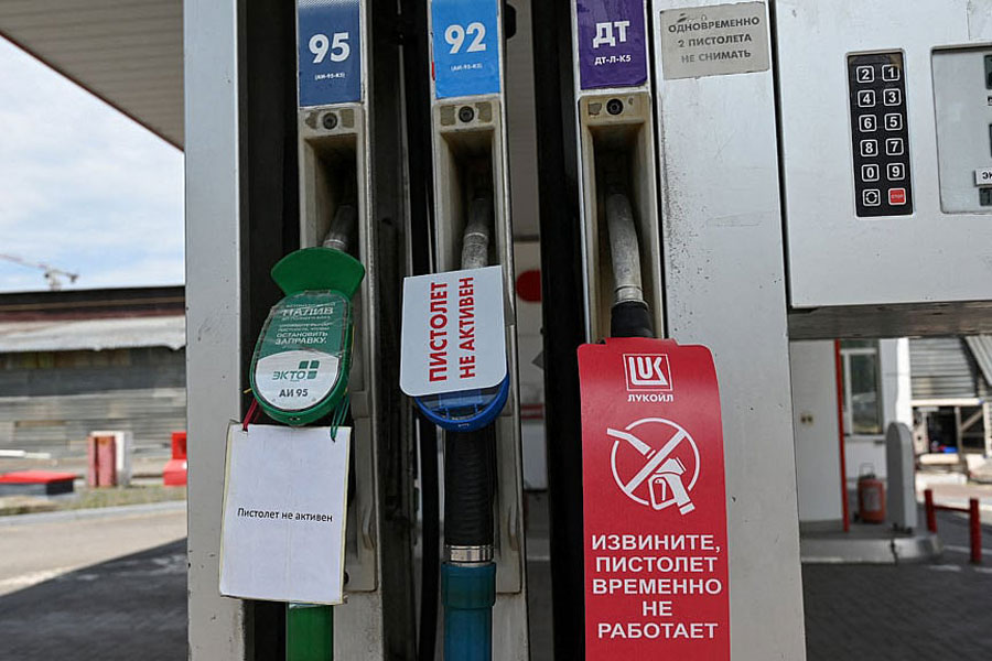 Signs inform of non-working fuel pump nozzles at a petrol station, as according to local officials some regional filling stations face gasoline shortages due to production cuts at major refineries, amid the Russia-Ukraine conflict in Rostov-on-Don, Russia, Jun 23, 2026.