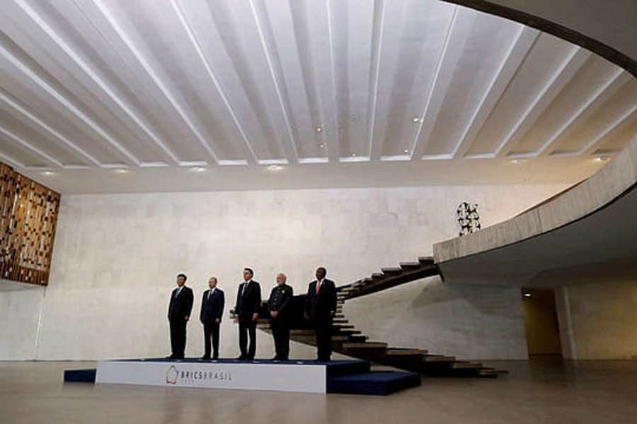 BRICS leaders including Russia's Vladimir Putin and South Africa's Cyril Ramaphosa pose for as they arrive for the BRICS summit in Brasilia, Brazil November 14, 2019.