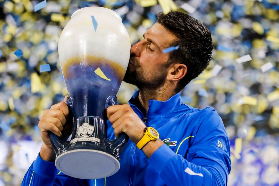 Novak Djokovic (SRB) kisses the Rookwood Cup after the victory over Carlos Alcaraz (ESP) during the men's singles final of the Western and Southern Open tennis tournament at Lindner Family Tennis Center in Mason, Ohio, USA on Aug 20, 2023 — USA TODAY Sports via REUTERS