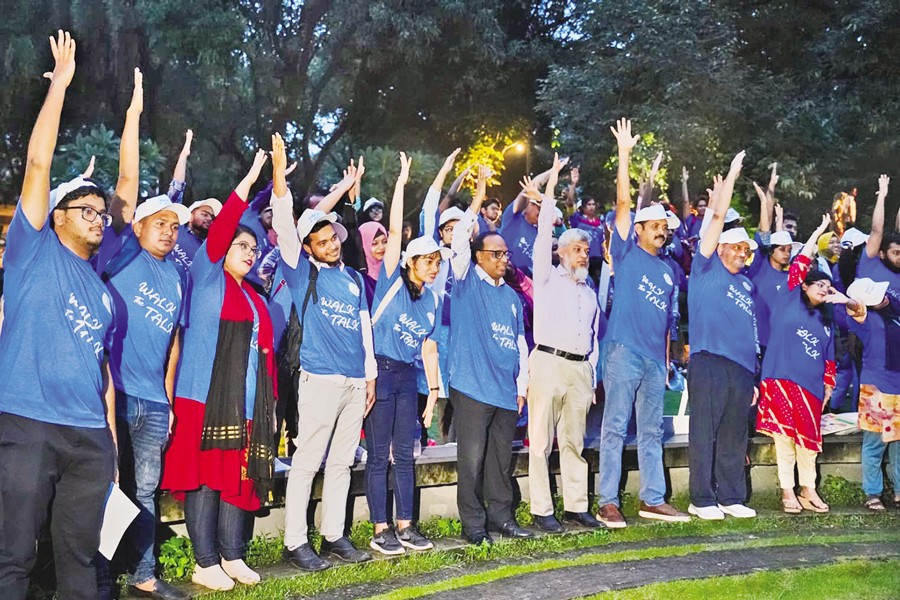 Youths taking part in yoga session during the ‘Walk the Talk’ event with guests at Justice Shahabuddin Park in Dhaka recently