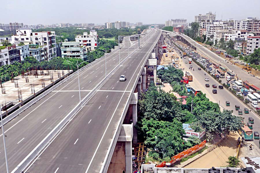 This portion of the Dhaka Elevated Expressway, stretching from Hazrat Shahjalal International Airport area to Farmgate, is set to open to traffic on September 2. The Expressway will contribute to easing traffic congestions to a great extent. The photo was taken in Kakali area of the city on last August 22. —FE photo by KAZ Sumon