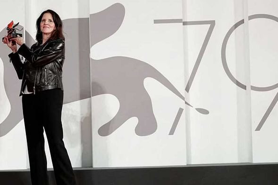 The 79th Venice Film Festival - Awards Ceremony - Venice, Italy, Sept 10, 2022 - Director Laura Poitras poses with the Golden Lion Award for Best Film.