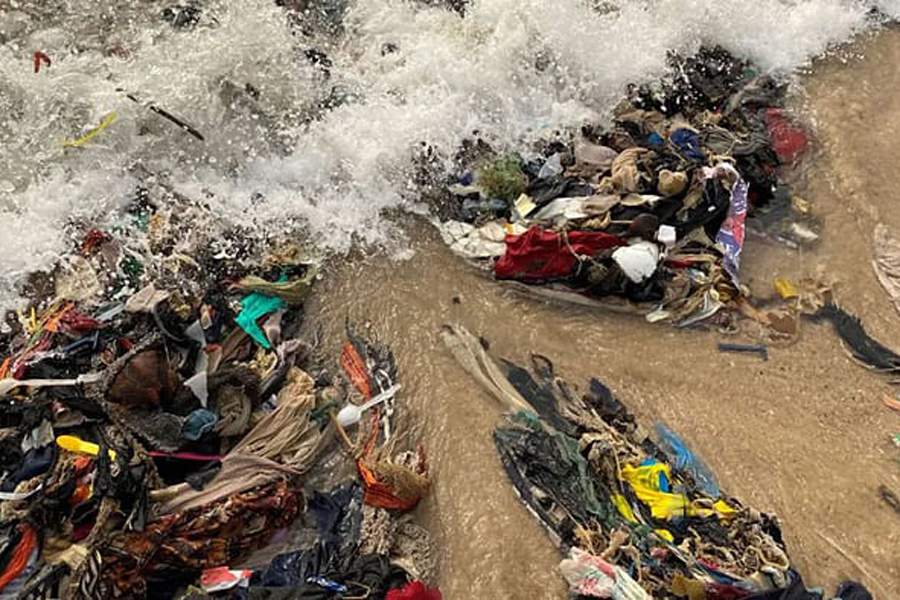 Clothing that cannot be sold by Kantamanto traders ends up on Osu Beach in Accra, Ghana.