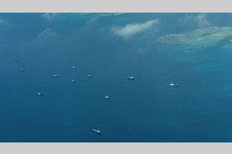An aerial view of what Philippine Coast Guard alleges were Chinese vessels, manned by Chinese maritime militia loitering within the vicinity of Thitu Island, one of nine features occupied by the Philippines in Spratly Islands, in the disputed South China Sea, March 9, 2023.