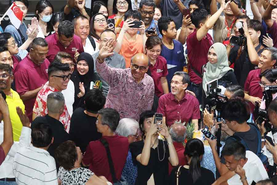 Singapore’s Presidential candidate Tharman Shanmugaratnam gesturing to his supporters after balloting has concluded in the presidential election in Singapore on Friday –Reuters photo