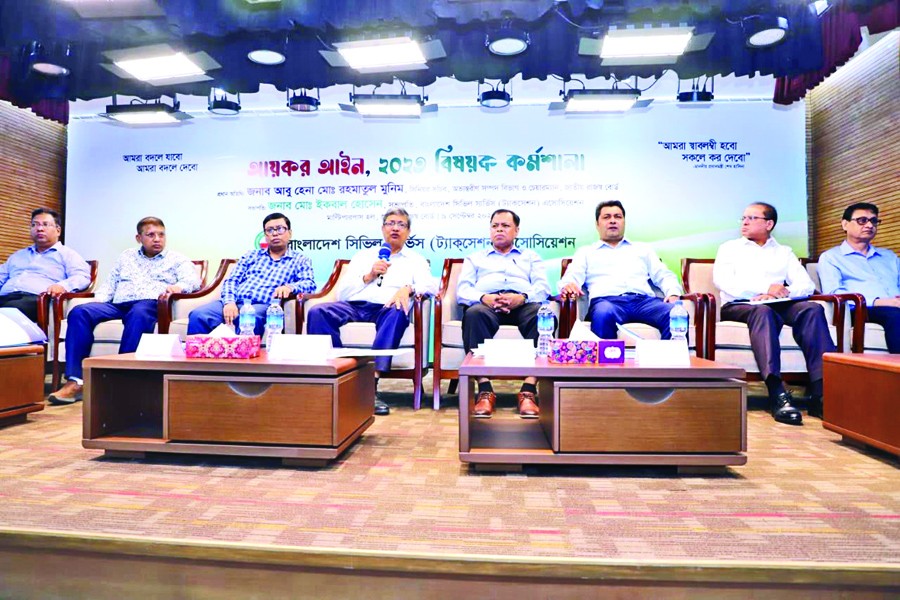 NBR Chairman Abu Hena Md Rahmatul Muneem speaks at a workshop on new Income Tax Act-2023, organised by the BCS Taxation Association in Dhaka on Saturday.