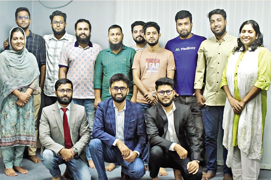 Team MedEasy with the three co-founders kneeling in the front