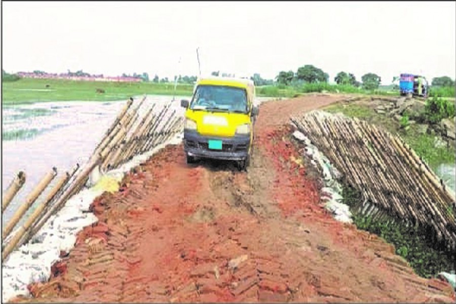 A partial view of the dilapidated Sunamganj-Jamalganj road of Sunamganj district — FE Photo