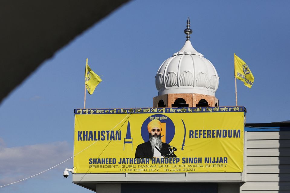 A banner with the image of Sikh leader Hardeep Singh Nijjar is seen at the Guru Nanak Sikh Gurdwara temple, site of his June 2023 killing, in Surrey, British Columbia, Canada on September 20, 2023 — Reuters/Files