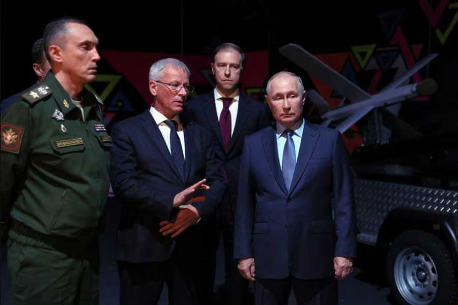 Russian President Vladimir Putin, accompanied by Deputy Prime Minister Denis Manturov, Deputy Defence Minister Alexei Krivoruchko and other officials, attending the Gunsmith Forum in the city of Izhevsk in Russia on September 19 this year –Reuters file photo