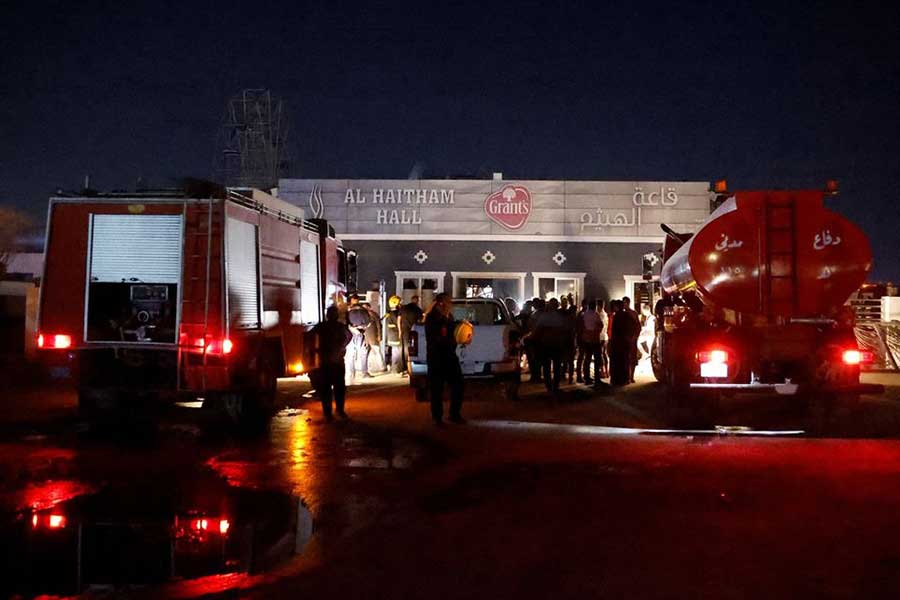 People and emergency personnel gathering at the site following a fire at a wedding celebration in the district of Hamdaniya in Iraq's Nineveh province in Iraq on Wednesday –Reuters photo