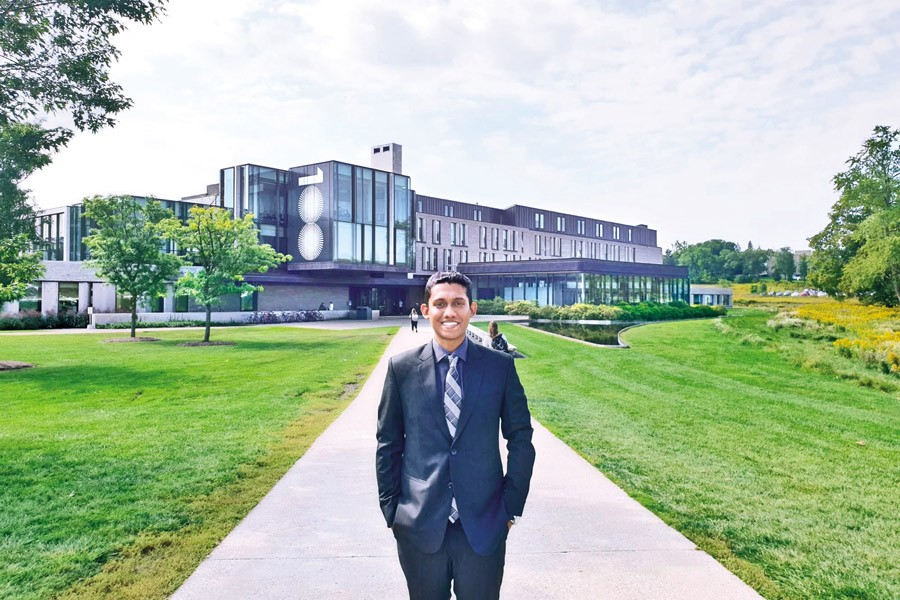 Mahir Kamal in front of Ivey Business School