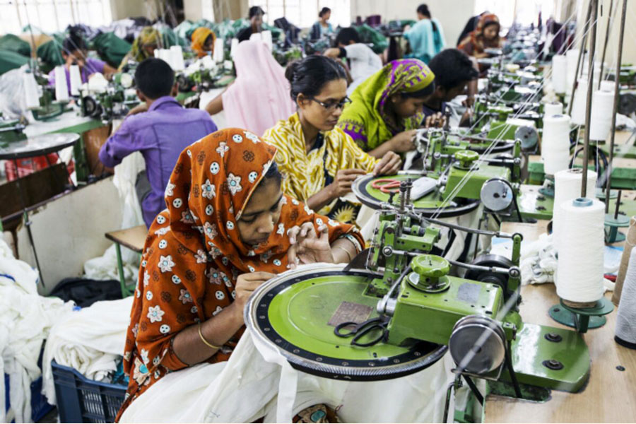 Workers at a textile factory in Dhaka —Agency Photo