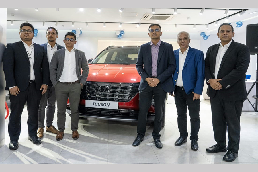 Fair Technology' Director and CEO and other high up executives poses for photo at the unveiling ceremony of Hyundai's TUCSON