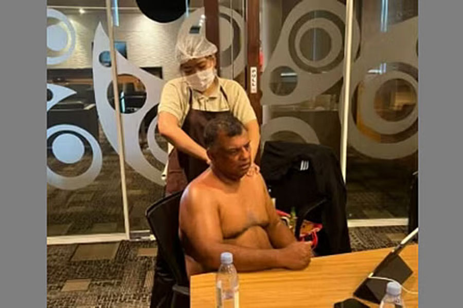 AirAsia CEO shares a photo of himself receiving a massage during a management meeting.