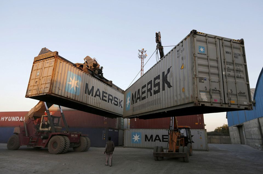 Mobile cranes prepare to stack containers at Thar Dry Port in Sanand in the western state of Gujarat, India on February 10, 2016 — Reuters/Files