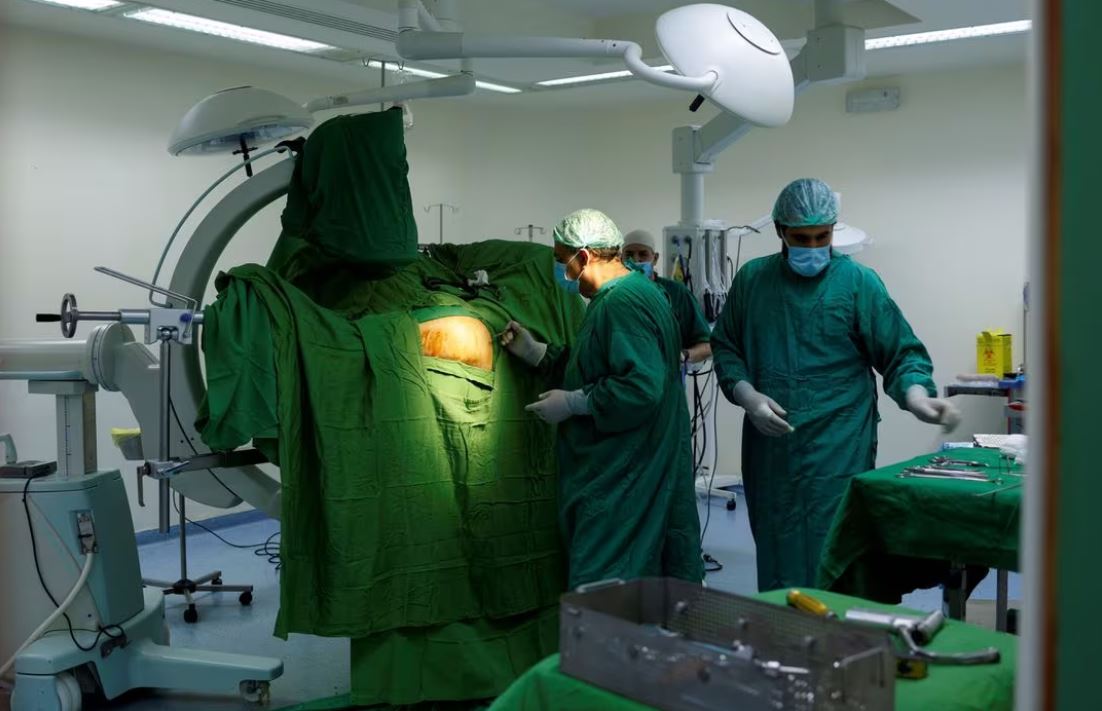 Doctor Moussa Abbas performs a surgery in Tebnin governmental hospital, in Tebnin, southern Lebanon November 10, 2023. REUTERS/Alaa Al-Marjani