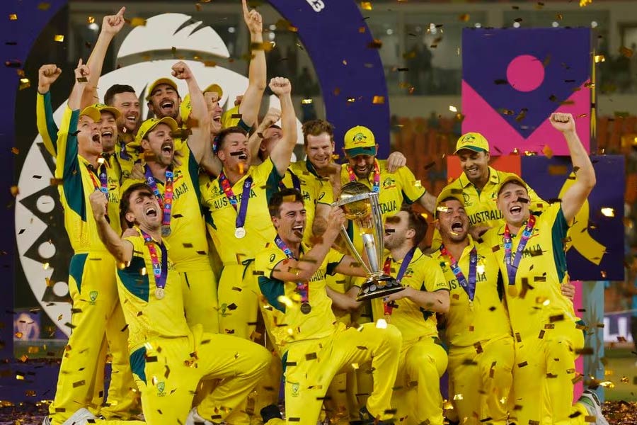 Australia's Pat Cummins celebrating with the trophy and teammates after winning the ICC Cricket World Cup at Narendra Modi Stadium in Ahmedabad of India on Sunday –Reuters photo