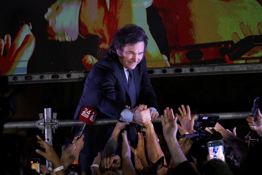 Argentine president-elect Javier Milei greets supporters after winning Argentina's runoff presidential election, in Buenos Aires, Argentina November 19, 2023.