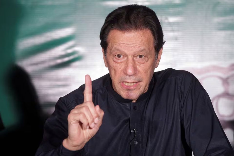 Pakistan’s former Prime Minister Imran Khan, gestures as he speaks to the members of the media at his residence in Lahore, Pakistan May 18, 2023. REUTERS/Mohsin Raza/File Photo Acquire Licensing Rights