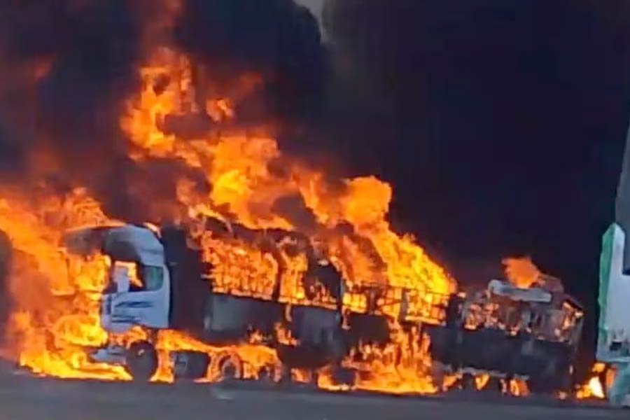 Smoke rising as a truck burns near the Myanmar-China border, near Muse of Myanmar, in this screen grab obtained from a social media video released on November 23, 2023 –Reuters file photo
