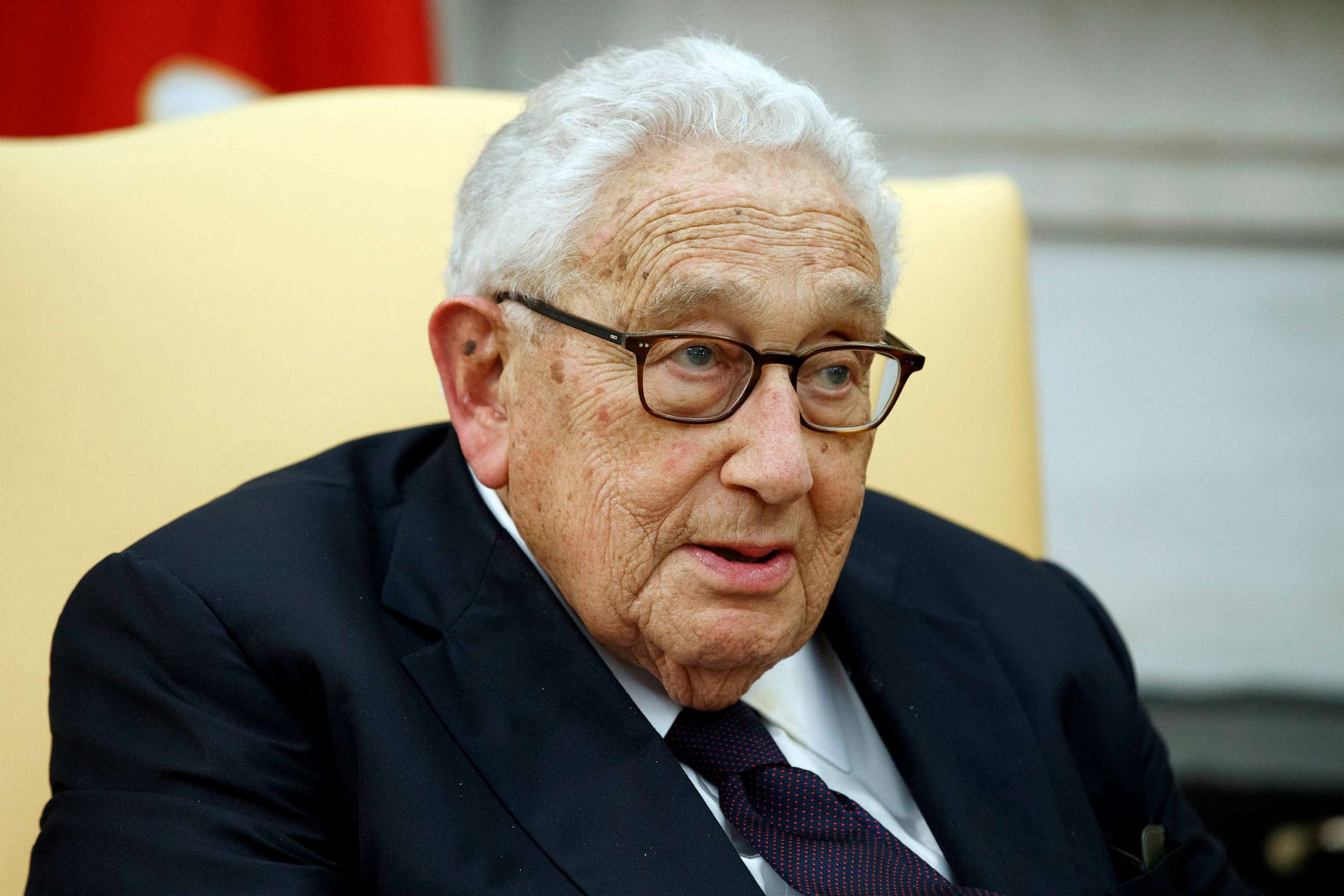 Former Secretary of State Henry Kissinger speaks in the Oval Office of the White House, Oct 10, 2017, in Washington. Evan Vucci/AP, FILE