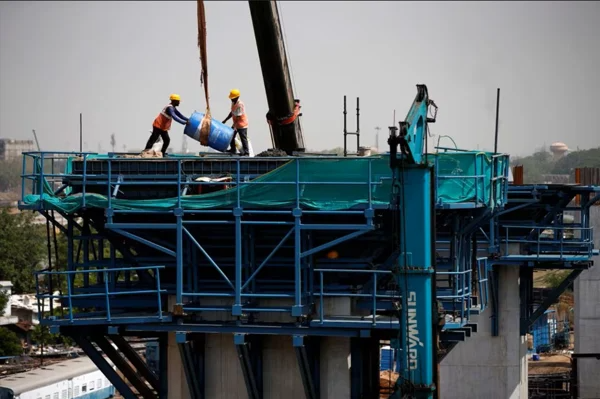 Labourers work at a construction site of the Ahmedabad-Mumbai High Speed Rail corridor in Ahmedabad, India, May 31, 2023. |REUTERS
