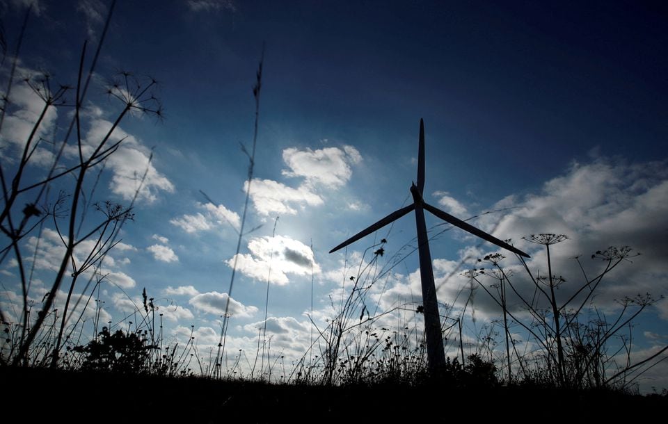 A general view of a wind turbine at Westmill Wind Farm & Solar Park, which is owned by the community and supports local renewable energy, at Watchfield, near Swindon, Britain, September 24, 2021. REUTERS/Andrew Boyers/File Photo