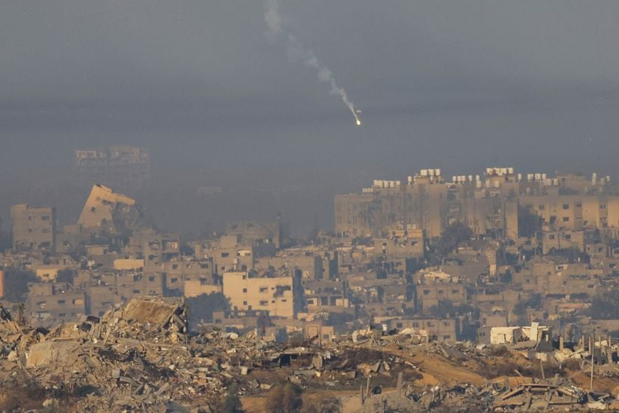 A flare falls over Gaza, after a temporary truce between Israel and the Palestinian Islamist group Hamas expired, as seen from southern Israel on December 3, 2023 — Reuters photo