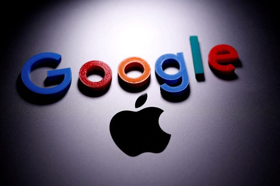 A 3D printed Google logo is placed on the Apple Macbook in this illustration taken on April 12, 2020 — Reuters illustration/Files