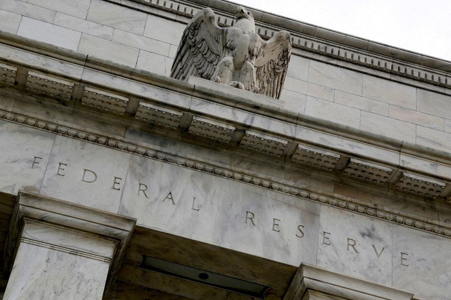 An eagle tops the US Federal Reserve building’s facade in Washington, July 31, 2013.