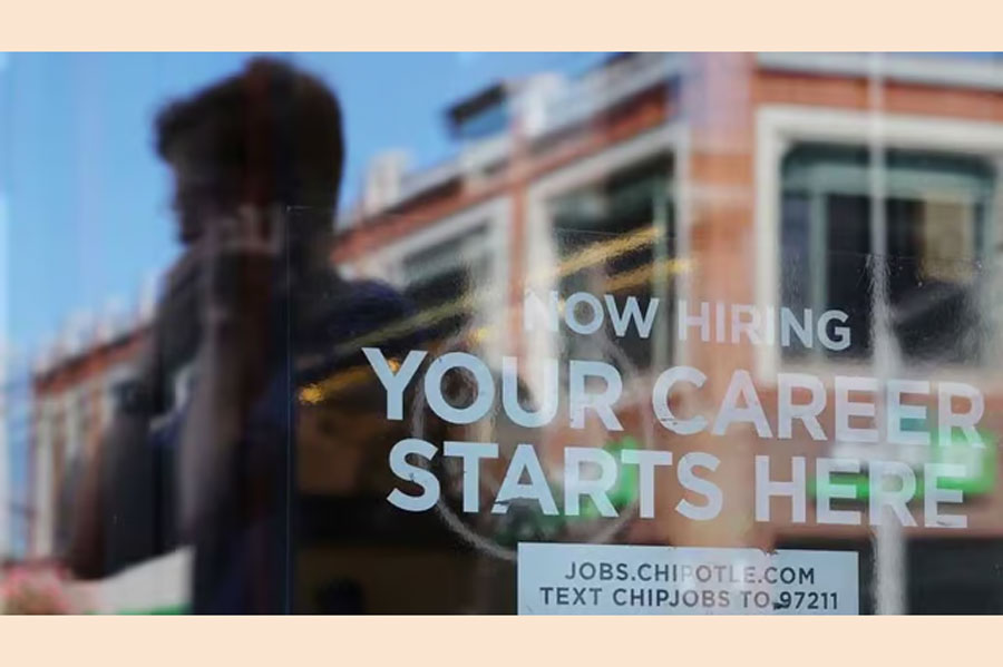 A Chipotle restaurant advertises it is hiring in Cambridge, Massachusetts, US, August 28, 2023.REUTERS/Brian Snyder
