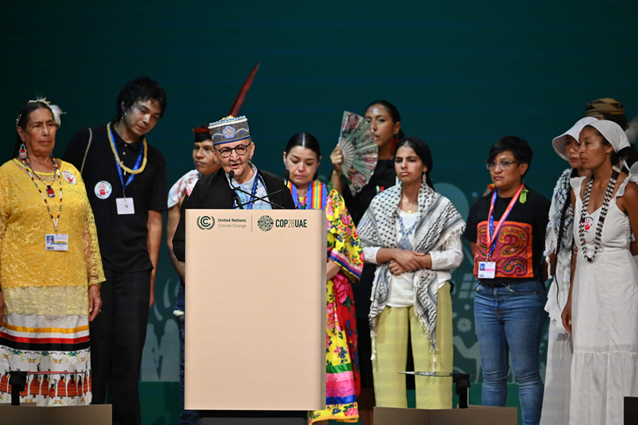 Representatives of indigenous people around the world speak during the People's Plenary at the United Nations Climate Conference (COP28) at Expo City in Dubai on December 11, 2023 --AFP Photo