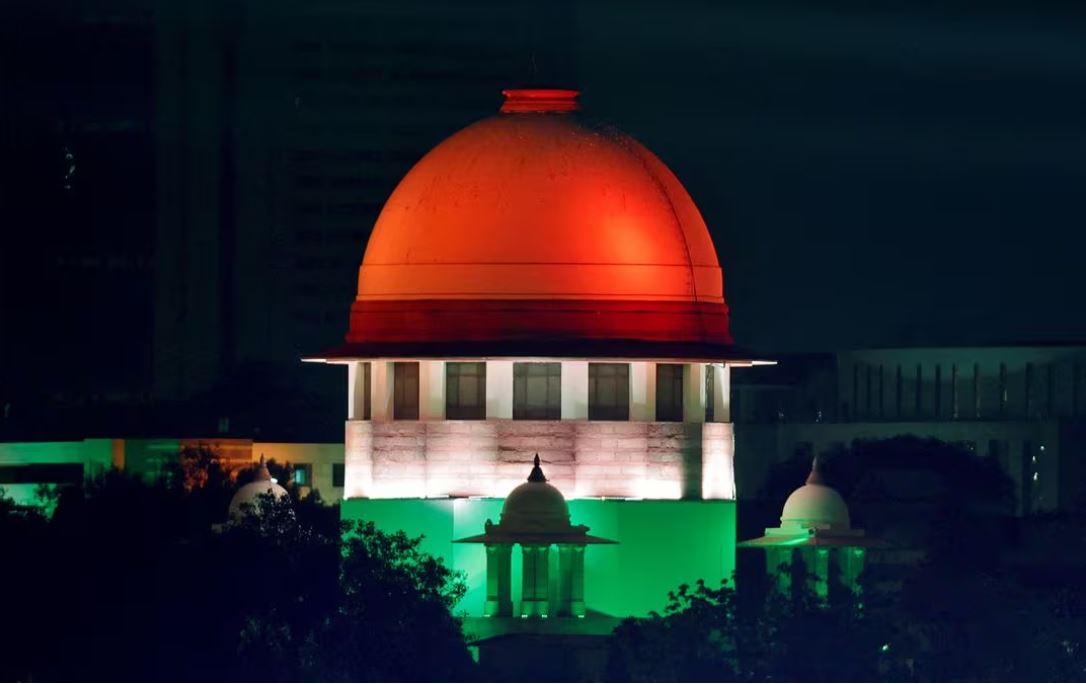 Illuminated Supreme Court building is pictured from the International Media Center during the G20 Summit in New Delhi, India, September 9, 2023. REUTERS/Amit Dave/File Photo