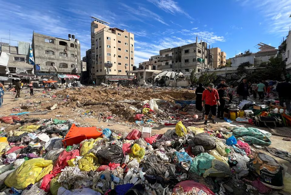 Palestinians inspect damages following an Israeli raid at Kamal Adwan hospital, amid the ongoing conflict between Israel and Palestinian Islamist group Hamas, in the northern Gaza Strip on December 16, 2023 — Reuters photo