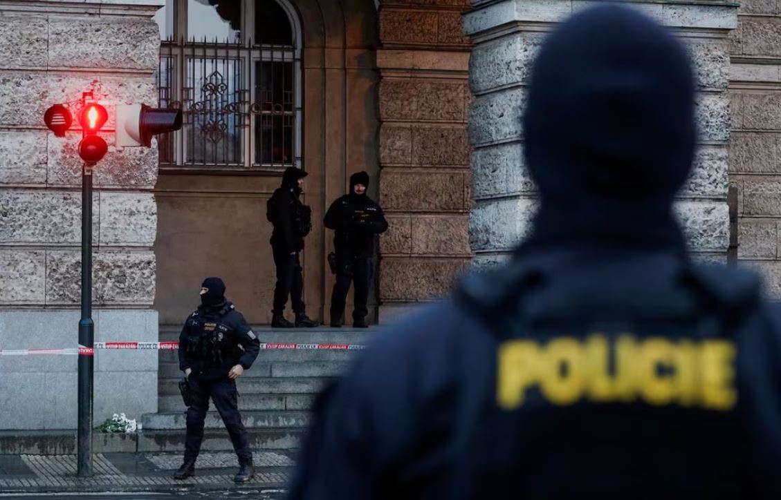 Members of the Police stand guard following a shooting at one of Charles University's buildings in Prague, Czech Republic, December 22, 2023. REUTERS/David W Cerny
