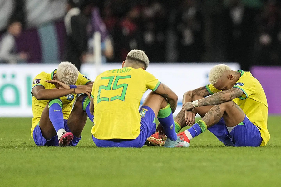 Brazil's Rodrygo, Brazil's Pedro and Brazil's Neymar, from right, sit on the pitch after losing the World Cup quarterfinal soccer match between Croatia and Brazil, at the Education City Stadium in Al Rayyan, Qatar on December 9, 2022 — AP/Files