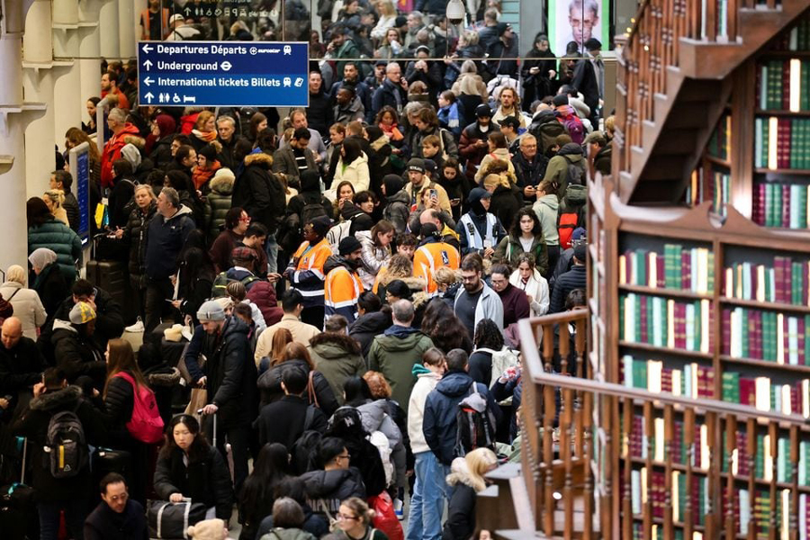 Passengers gather at the departure gates of the Eurostar terminal at St Pancras International Station after the services are cancelled due to a flooded tunnel, in London, Britain, December 30, 2023.