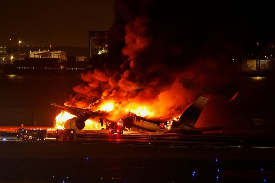 Japan Airlines’ A350 airplane is on fire at Haneda international airport in Tokyo, Japan, January 2, 2024.