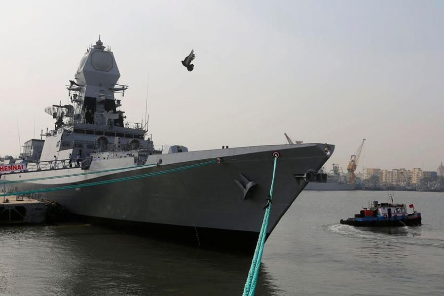 A bird flies past the newly built INS Chennai, India’s third indigenously designed guided missile destroyer, ahead of its commissioning into the Navy in Mumbai, India Nov 18, 2016.