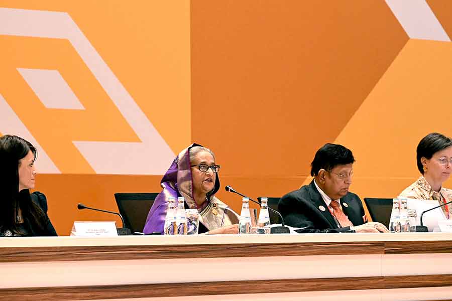 Prime Minister Sheikh Hasina addressing an event titled "Investment in Research and Development in LDCs for Smart and Innovative Societies" held at Auditorium-3 of Qatar National Convention Centre (QNCC) in Doha on Monday -PID photo