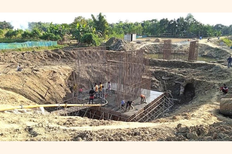 Workers busy constructing a railway bridge on the Kulaura-Barlekha route — FE Photo
