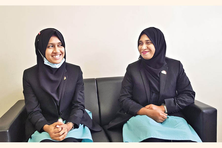 Moriom Afiza (L) and Asma Akther (R)